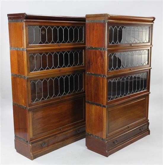 A pair of Globe Wernicke mahogany sectional bookcases. W.2ft 10in. D.1ft H.4ft 10in.
